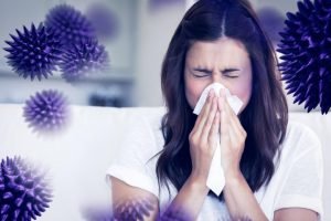 Woman Sneezing Due To Lack Of Indoor Air Quality